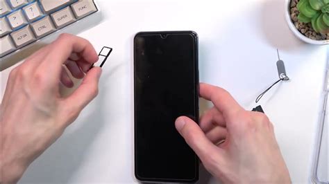 How to Insert SIM and SD Cards into VIVO Y76 5G .